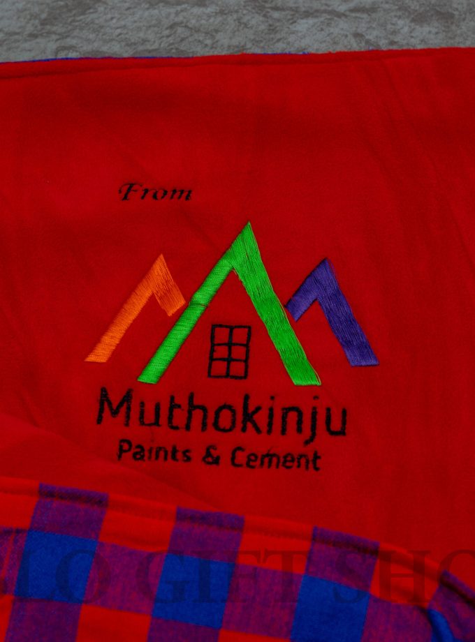 Maasai Light Fleece Blanket with a Mothokinju Logo