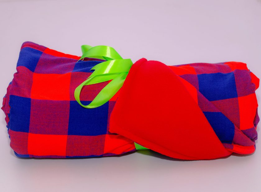 Maasai Light Fleece Blanket with a Mothokinju Logo - Image 2